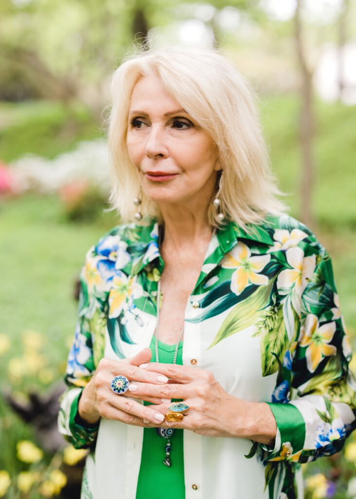 close up with green outfit and stackable rings