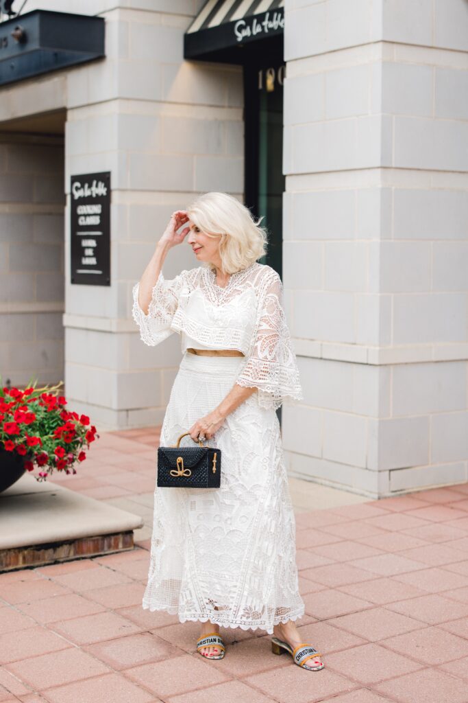 Dallas blogger wearing matching skirt set and black handbag