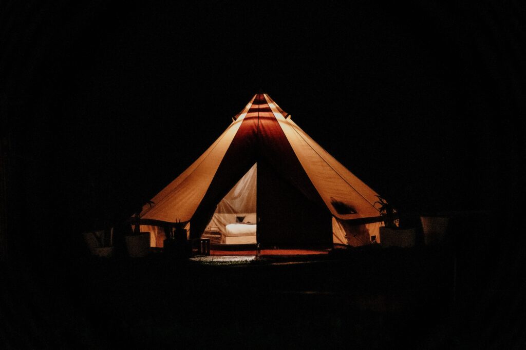 Glamping tent light up at night