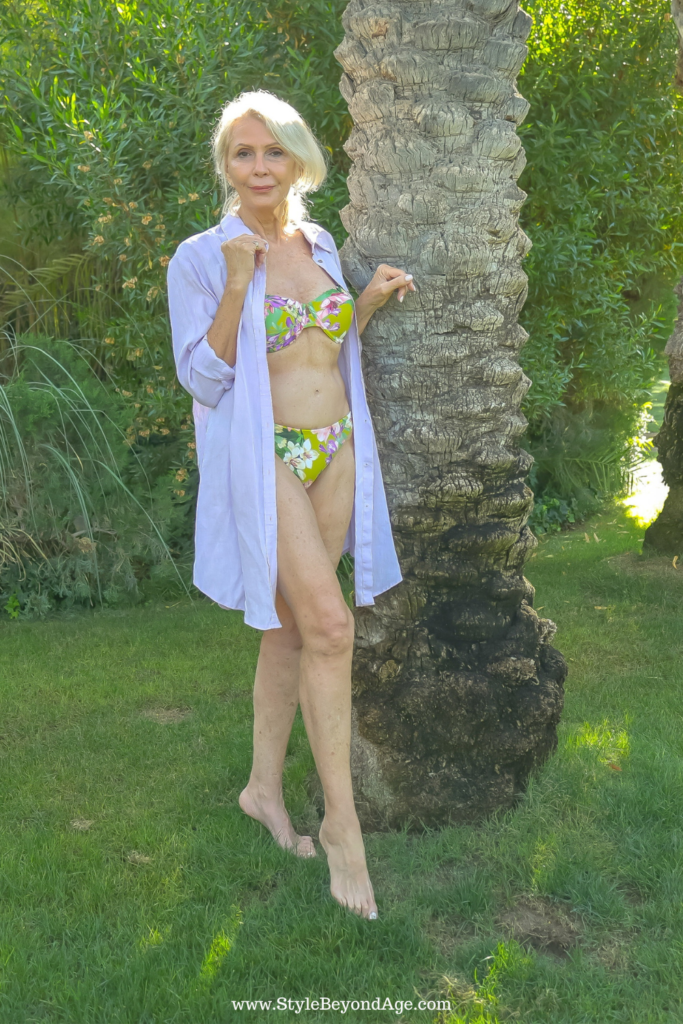 Sonia from style beyond age wearing floral swimsuit and white coverup