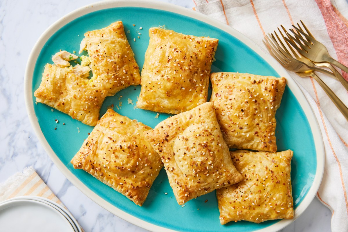 Salmon and egg breakfast hand pies with golden pastry and everything seasoning.