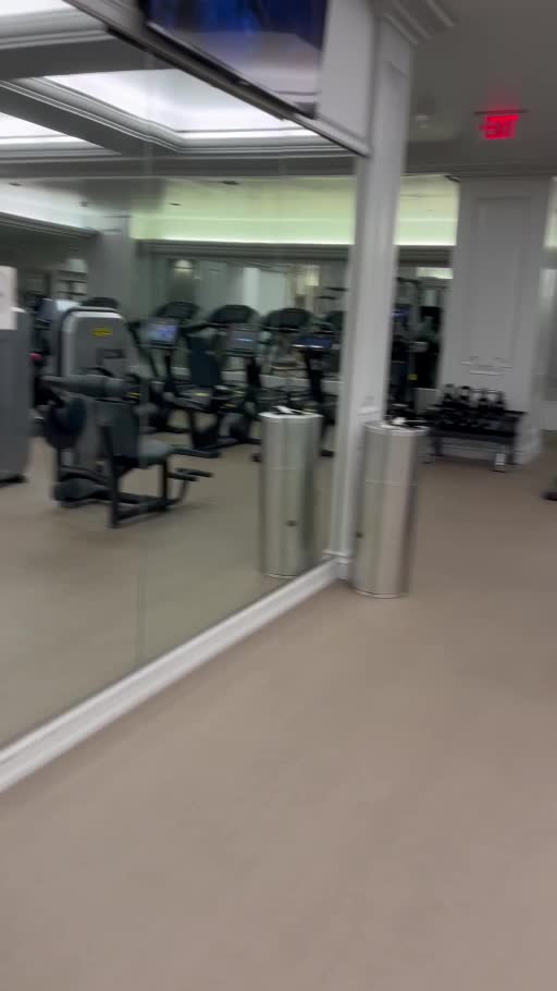 Fitness equipment and mirrors in the Crescent fitness center.